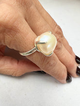Close up hand shot of Freshwater Pearl Ring in silver