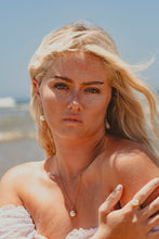 Freshwater Pearl Necklace on model at the beach.