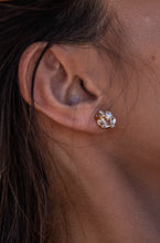 Close-up model shot of the Higher Realm Herkimer Diamond Stud Earrings in gold, showcasing the crystal clarity and radiant sparkle of the diamonds.