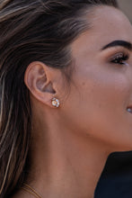 Close-up model shot of the Higher Realm Herkimer Diamond Stud Earrings in gold, showcasing the crystal clarity and radiant sparkle of the diamonds.