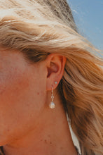 Close up of model wearing the silver Freshwater Pearl Earrings.