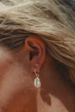 Close up of silver Sea Goddess Earrings