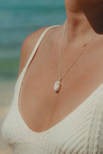 Model shot of the Sea Goddess Necklace in silver. 