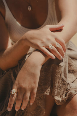 Model shot of hands wearing the Sea Goddess Ring