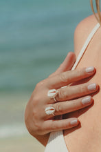 Close up of model wearing Sea Goddess Ring in silver. 