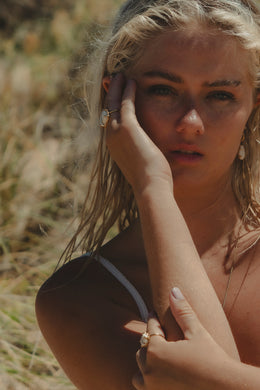 Model shot of Sea Goddess Earrings and Ring.